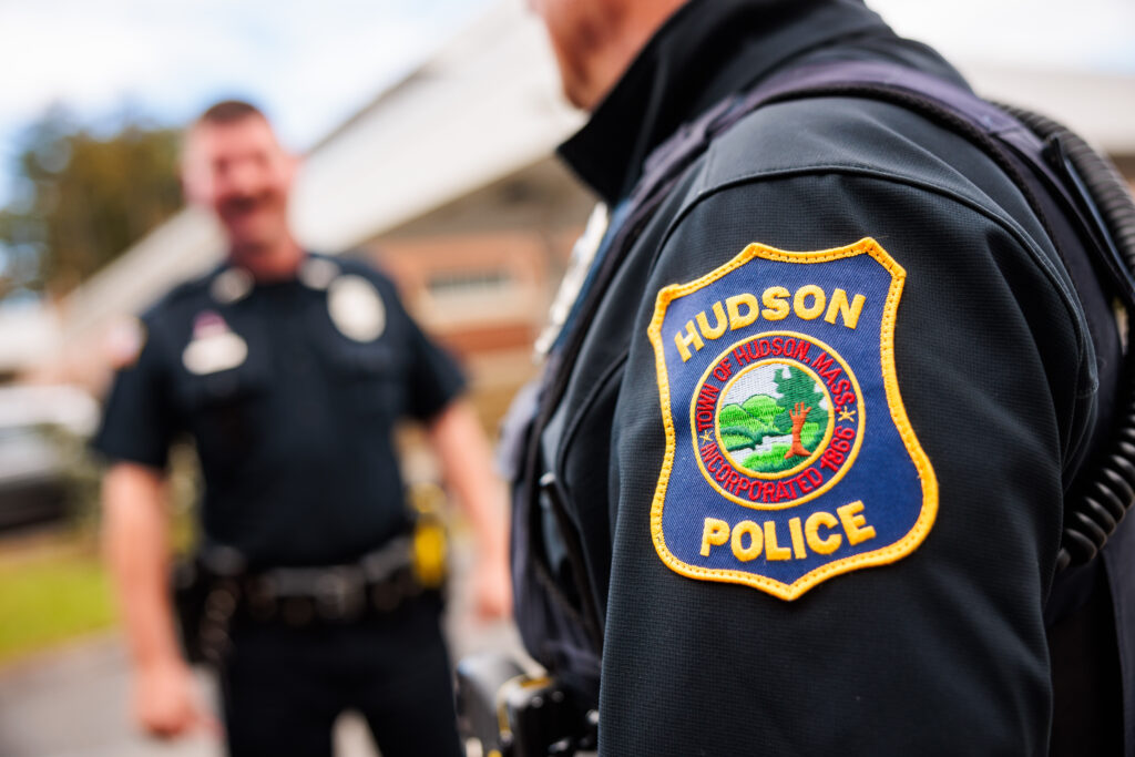 Close up of the Hudson Police patch on a uniform