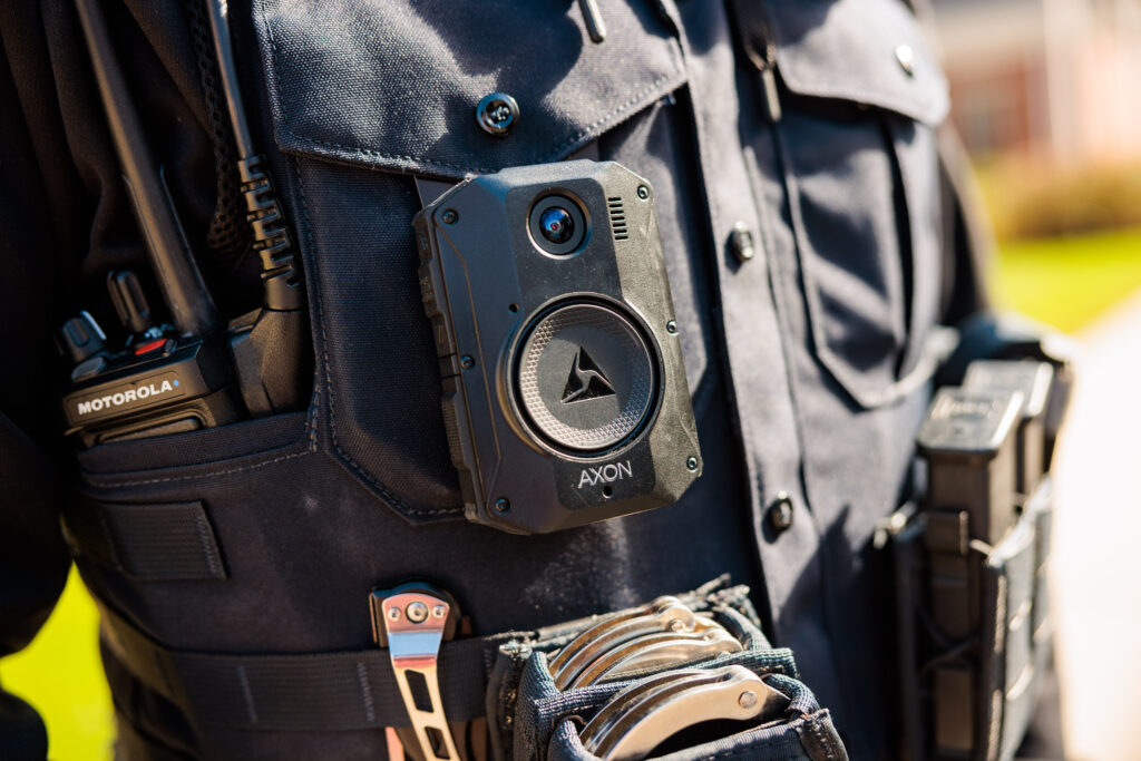 Close-up photo of a body camera worn by the Hudson Police Department.